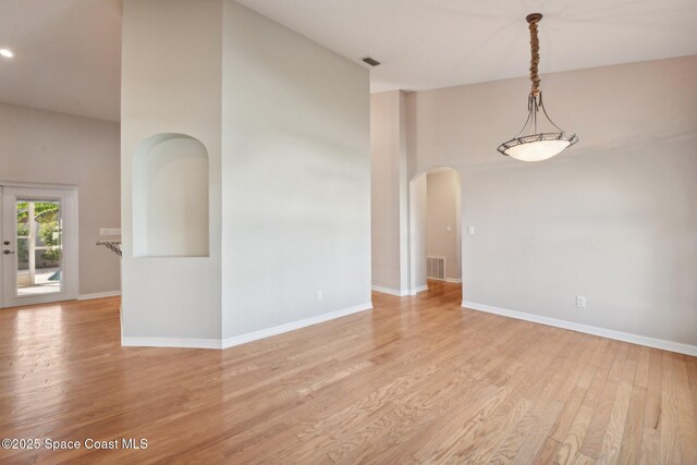 unfurnished room with light hardwood / wood-style flooring