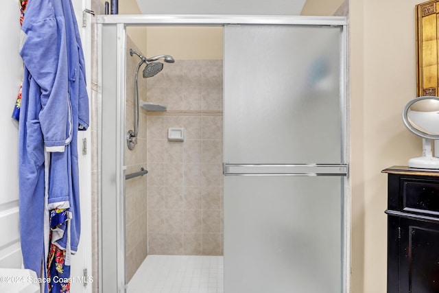 bathroom with vanity and an enclosed shower