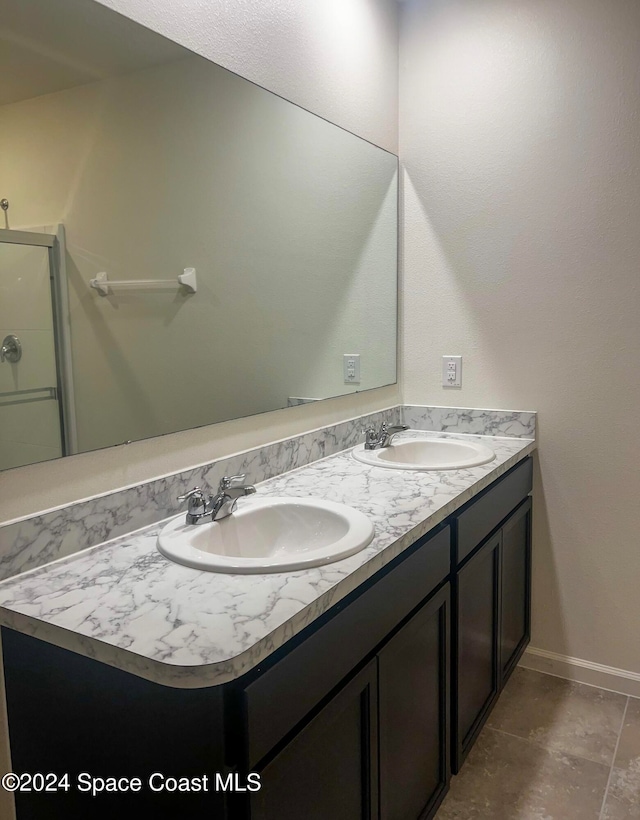 bathroom featuring vanity and walk in shower