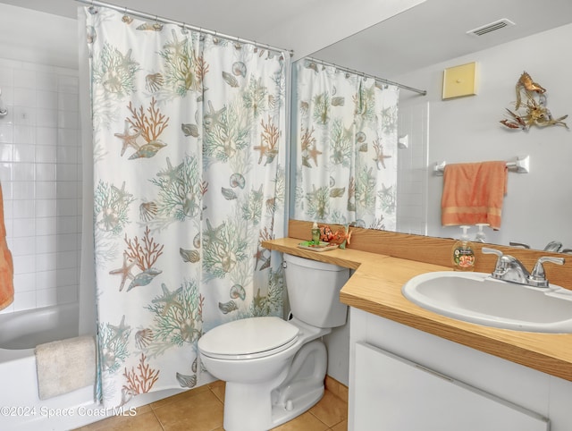 full bathroom with vanity, shower / bath combo, toilet, and tile patterned flooring