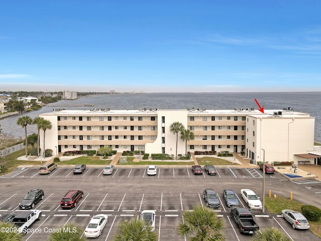 exterior space with a water view