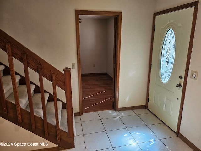 view of tiled foyer entrance