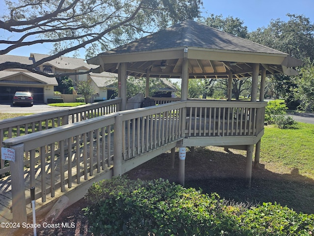 view of community featuring a gazebo and a deck