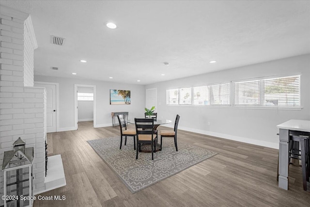 dining space featuring hardwood / wood-style flooring