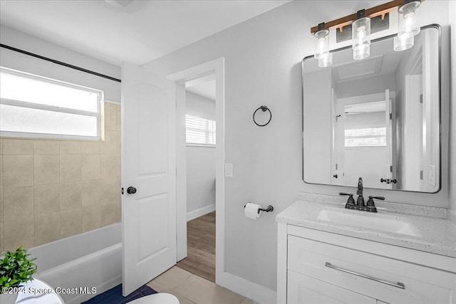 bathroom featuring vanity, wood-type flooring, and toilet