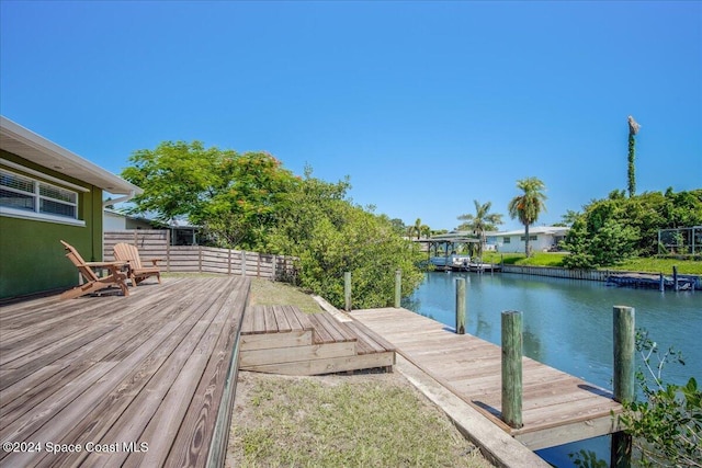 dock area with a water view