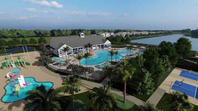 1366 Criswell Ln SE, Palm Bay, FL 32909 - drone / aerial view of a pool and a large body of water