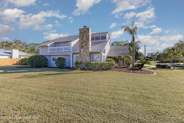 view of property featuring a front yard