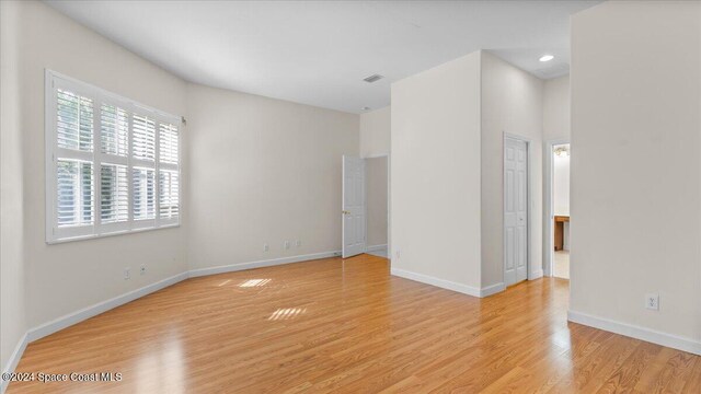 empty room with light wood-type flooring