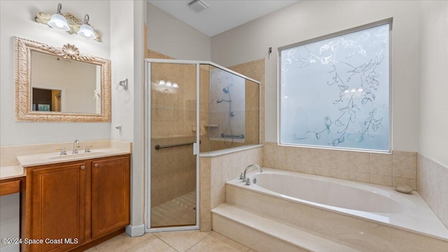 bathroom with vanity, independent shower and bath, and tile patterned floors