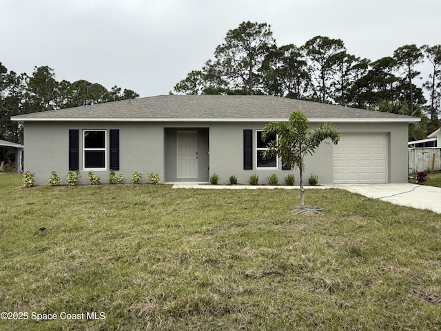 single story home with a garage and a front lawn