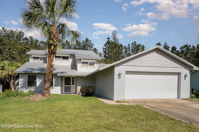 front of property with a garage and a front yard