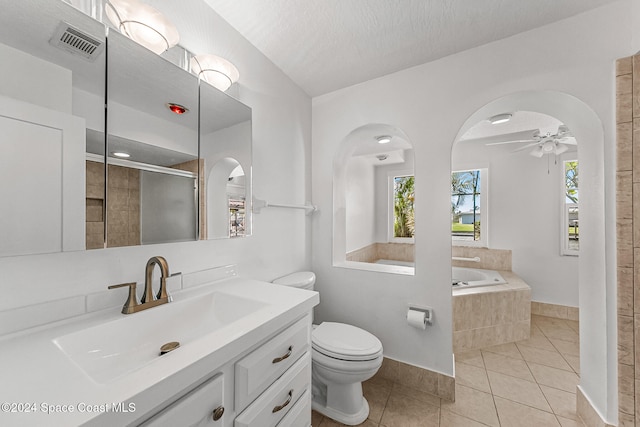 full bathroom featuring ceiling fan, a textured ceiling, tile patterned floors, shower with separate bathtub, and toilet