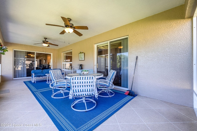 view of patio with ceiling fan