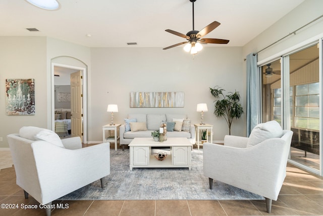 living room with tile patterned flooring