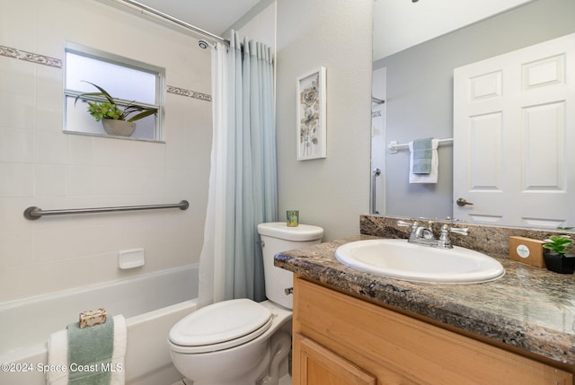 full bathroom featuring vanity, toilet, and shower / bathtub combination with curtain