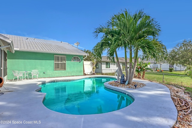 view of pool with a patio area