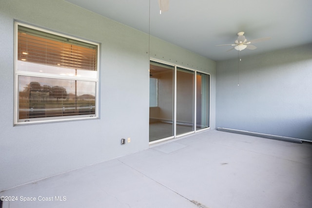 view of patio / terrace with a ceiling fan