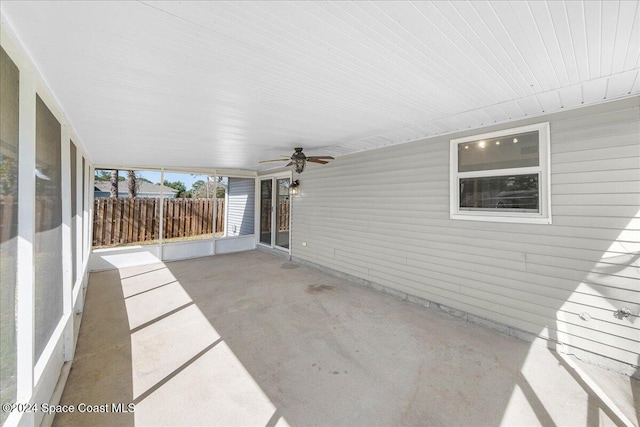 view of patio featuring ceiling fan