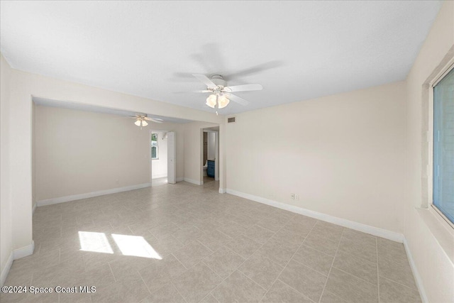 empty room featuring ceiling fan