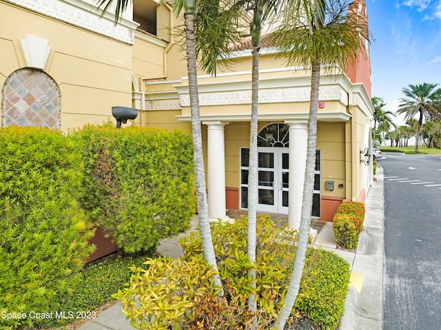 4975 Dixie Hwy NE Unit 201, Palm Bay, FL 32905 - view of exterior entry featuring stucco siding