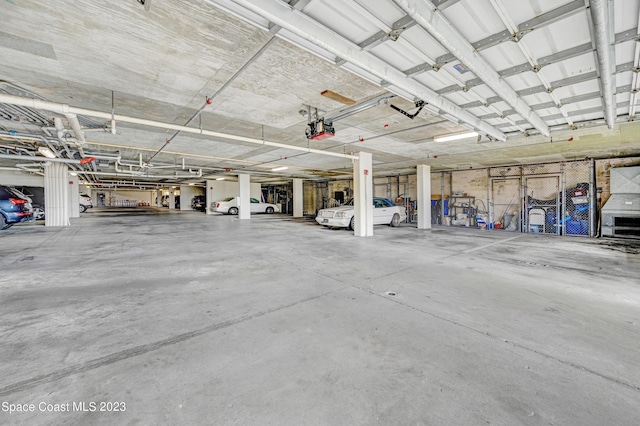 4975 Dixie Hwy NE Unit 201, Palm Bay, FL 32905 - parking deck with a garage door opener