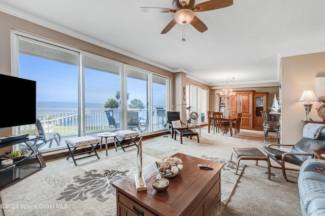 living room with crown molding, light colored carpet, and ceiling fan with notable chandelier