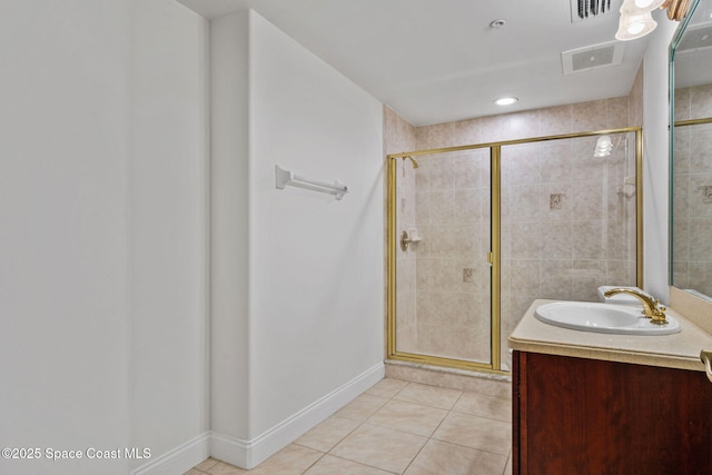 4975 Dixie Hwy NE Unit 201, Palm Bay, FL 32905 - full bath featuring tile patterned flooring, vanity, a shower stall, and baseboards