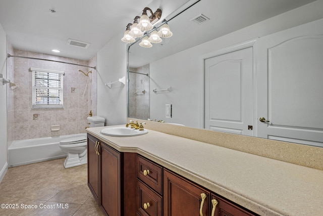 4975 Dixie Hwy NE Unit 201, Palm Bay, FL 32905 - full bathroom featuring vanity, shower / bath combination, toilet, and tile patterned floors