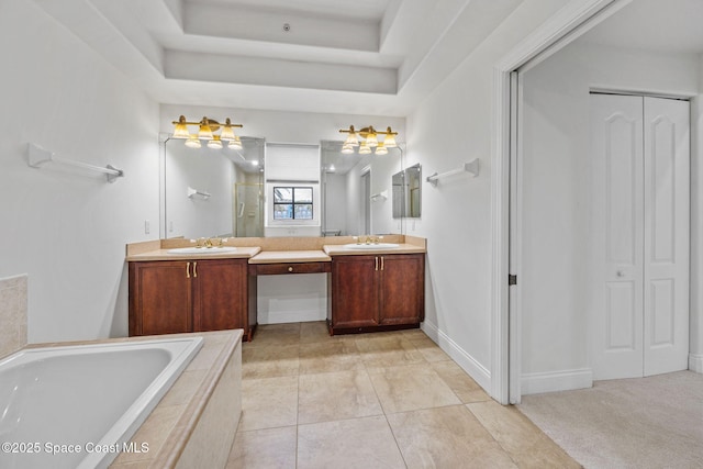 4975 Dixie Hwy NE Unit 201, Palm Bay, FL 32905 - full bathroom featuring double vanity, a closet, and tiled tub