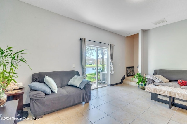 living room with light tile patterned floors