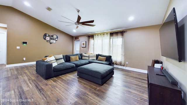 living room featuring lofted ceiling, ceiling fan, and dark hardwood / wood-style flooring