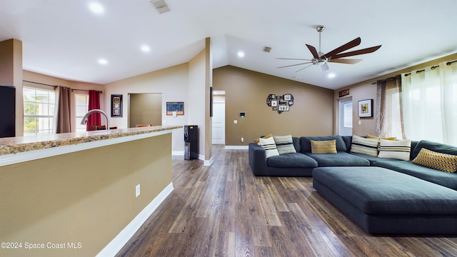 living room with sink, vaulted ceiling, ceiling fan, and dark hardwood / wood-style flooring