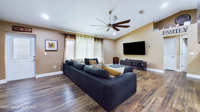 living room with dark wood-type flooring, vaulted ceiling, and ceiling fan