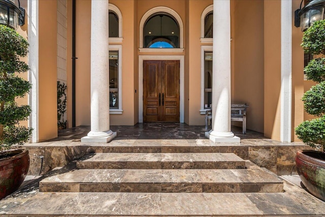 808 N Riverside Dr, Indialantic, FL 32903 - view of exterior entry with covered porch and stucco siding