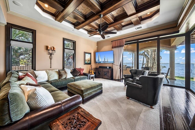 living room featuring ornamental molding, beamed ceiling, coffered ceiling, and plenty of natural light