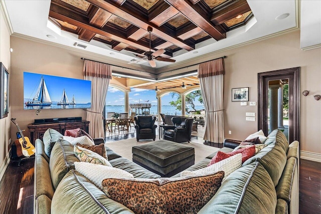 living room with a water view, hardwood / wood-style flooring, coffered ceiling, and ornamental molding