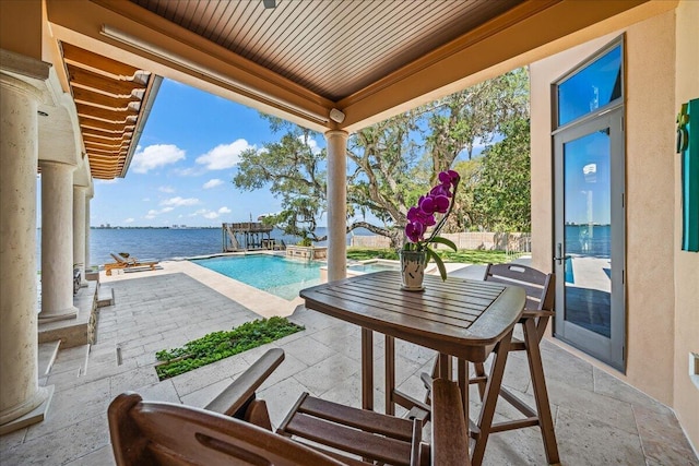808 N Riverside Dr, Indialantic, FL 32903 - view of patio / terrace featuring an outdoor pool and a water view