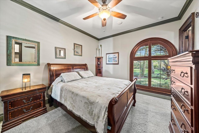 bedroom featuring ceiling fan, light carpet, and crown molding