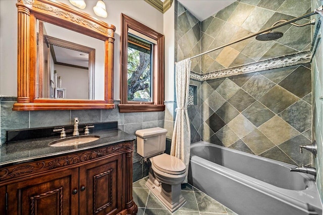 808 N Riverside Dr, Indialantic, FL 32903 - bathroom with tile walls, vanity, shower / bathtub combination with curtain, toilet, and ornamental molding