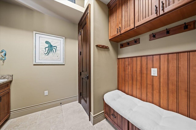 mudroom featuring light tile patterned floors