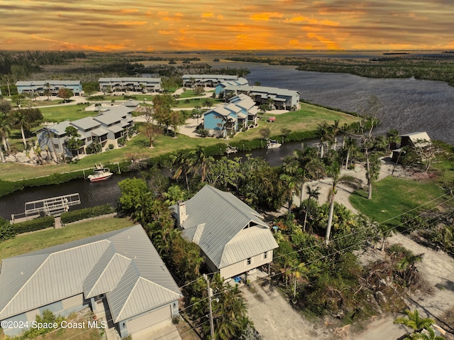 5232 Marina Dr, Bokeelia, FL 33922 - drone / aerial view featuring a water view