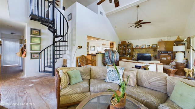 5232 Marina Dr, Bokeelia, FL 33922 - living area with stairs, visible vents, a ceiling fan, and high vaulted ceiling