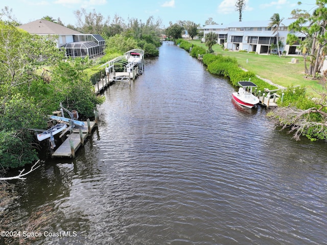 property view of water with a dock