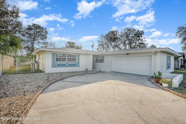 single story home with a garage