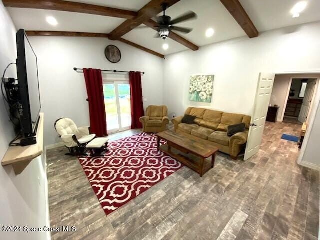 living room with hardwood / wood-style floors, lofted ceiling with beams, and ceiling fan