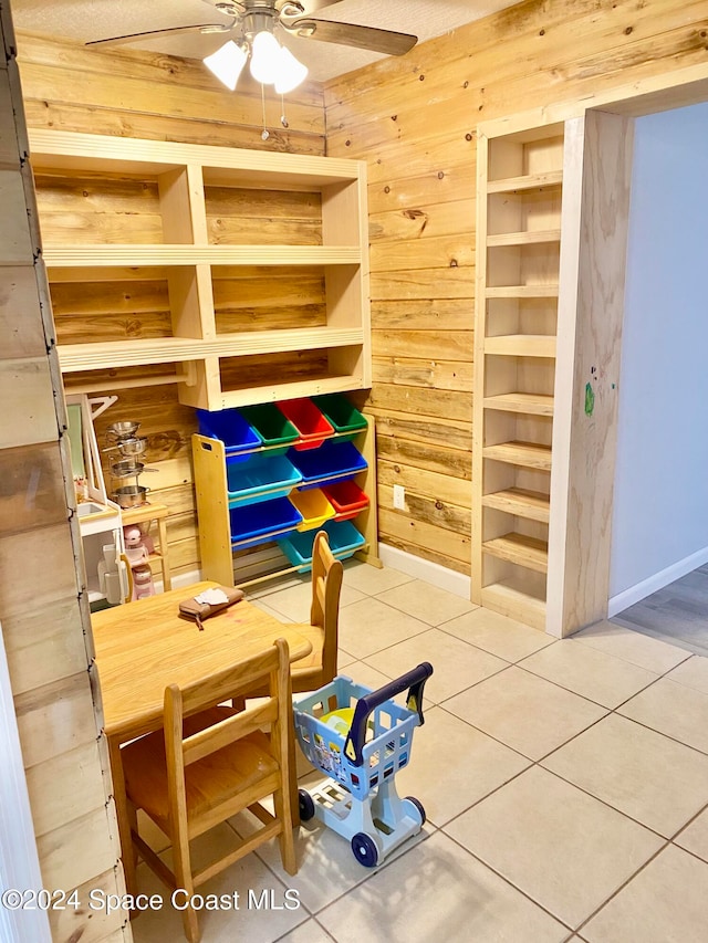 storage room featuring ceiling fan