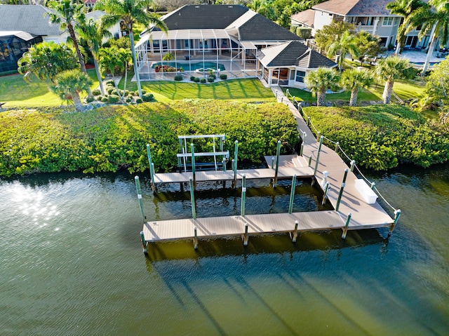 view of dock with a lawn, glass enclosure, boat lift, a pool, and a water view