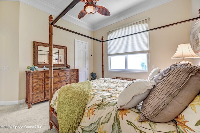 bedroom with ceiling fan, crown molding, and light colored carpet