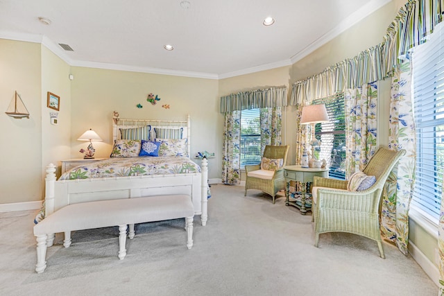 carpeted bedroom with crown molding